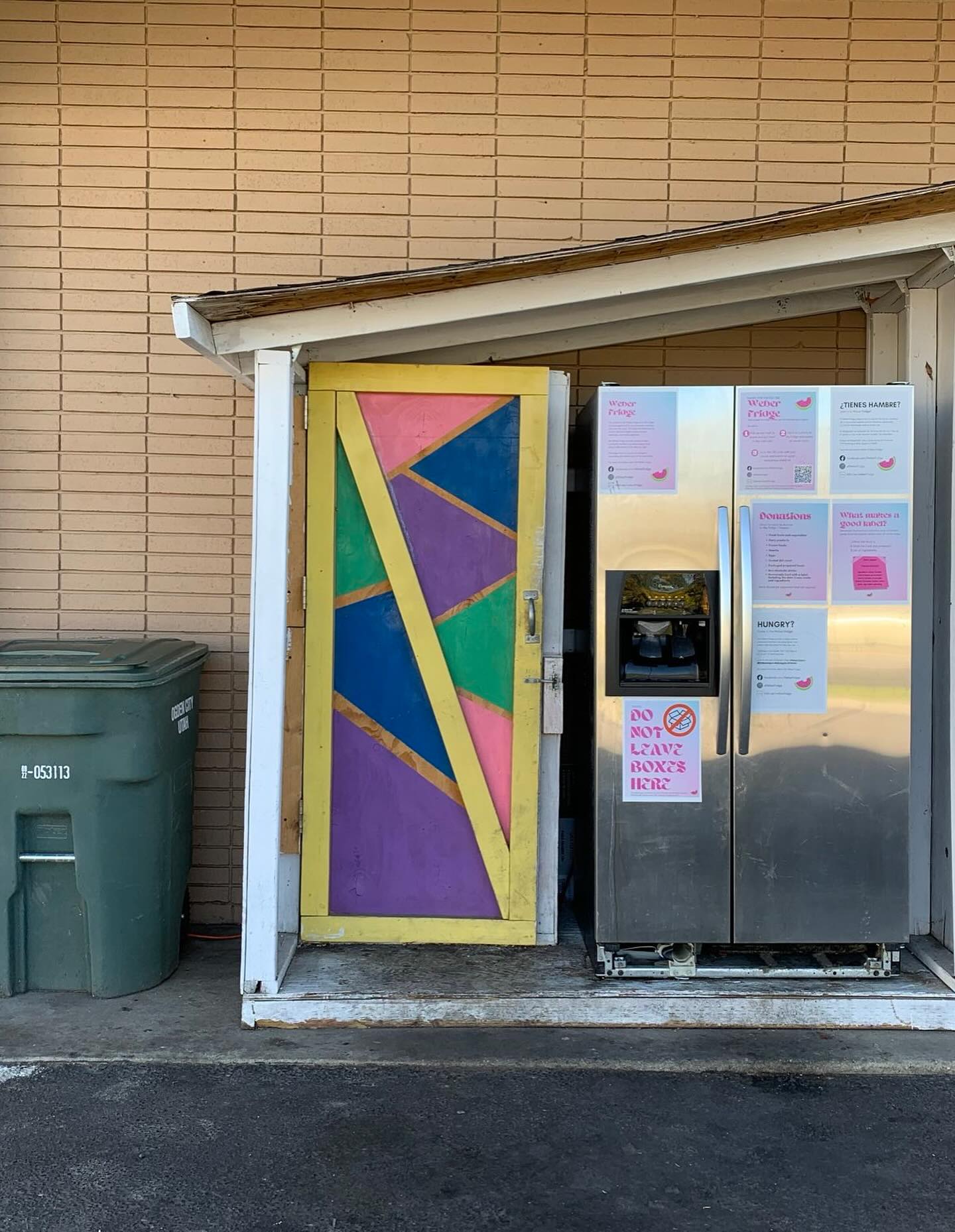 The exterior of the Weber Fridge with its colorful painted door